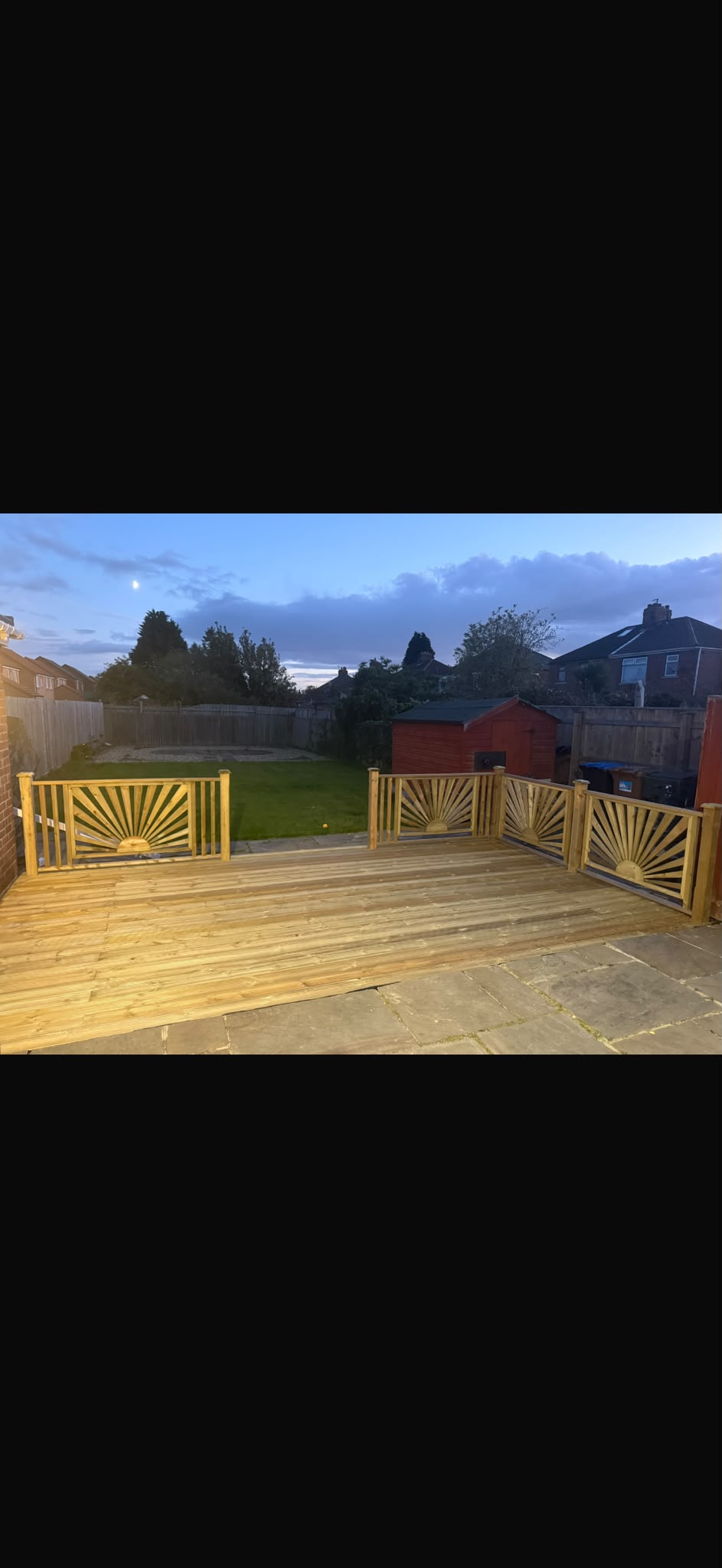 Timber decking with decorative balustrades.